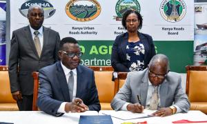 EBK Board Chair Signing Performance Contract 